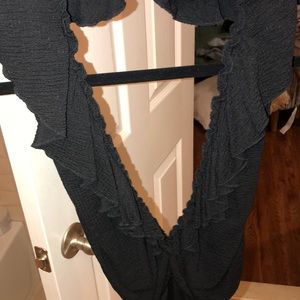 Plunging ruffle bodysuit with completely open back